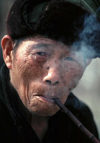 Man Smoking Pipe, Ghuizhou Province, China